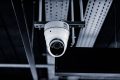 Indoor dome camera mounted under a cable tray