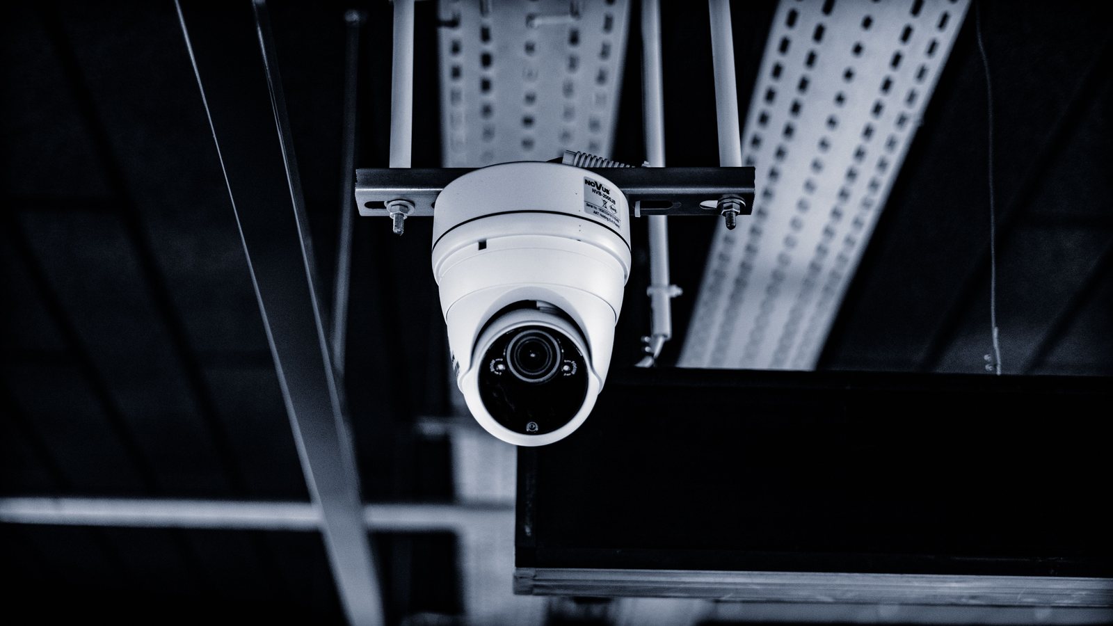 Indoor dome camera mounted under a cable tray