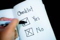 Hand-written checklist with yes and no boxes