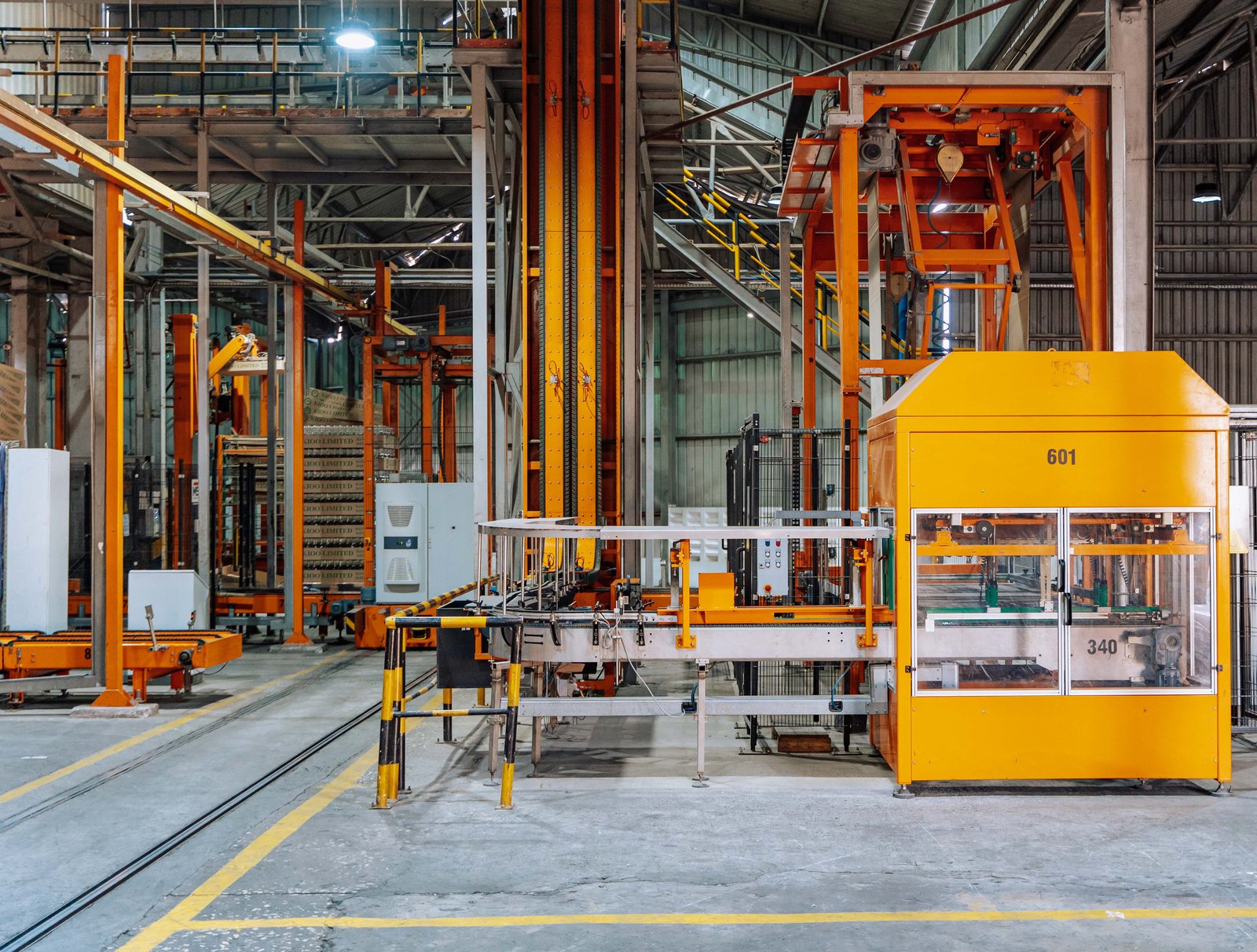 Manufacturing plant floor with automated production machinery